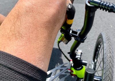 Brake operated by knee.